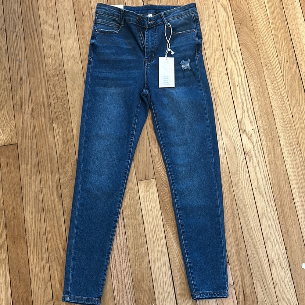High rise skinny jeans with rip details